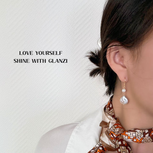 Ohrringe mit zwei barocker Süßwasserperle