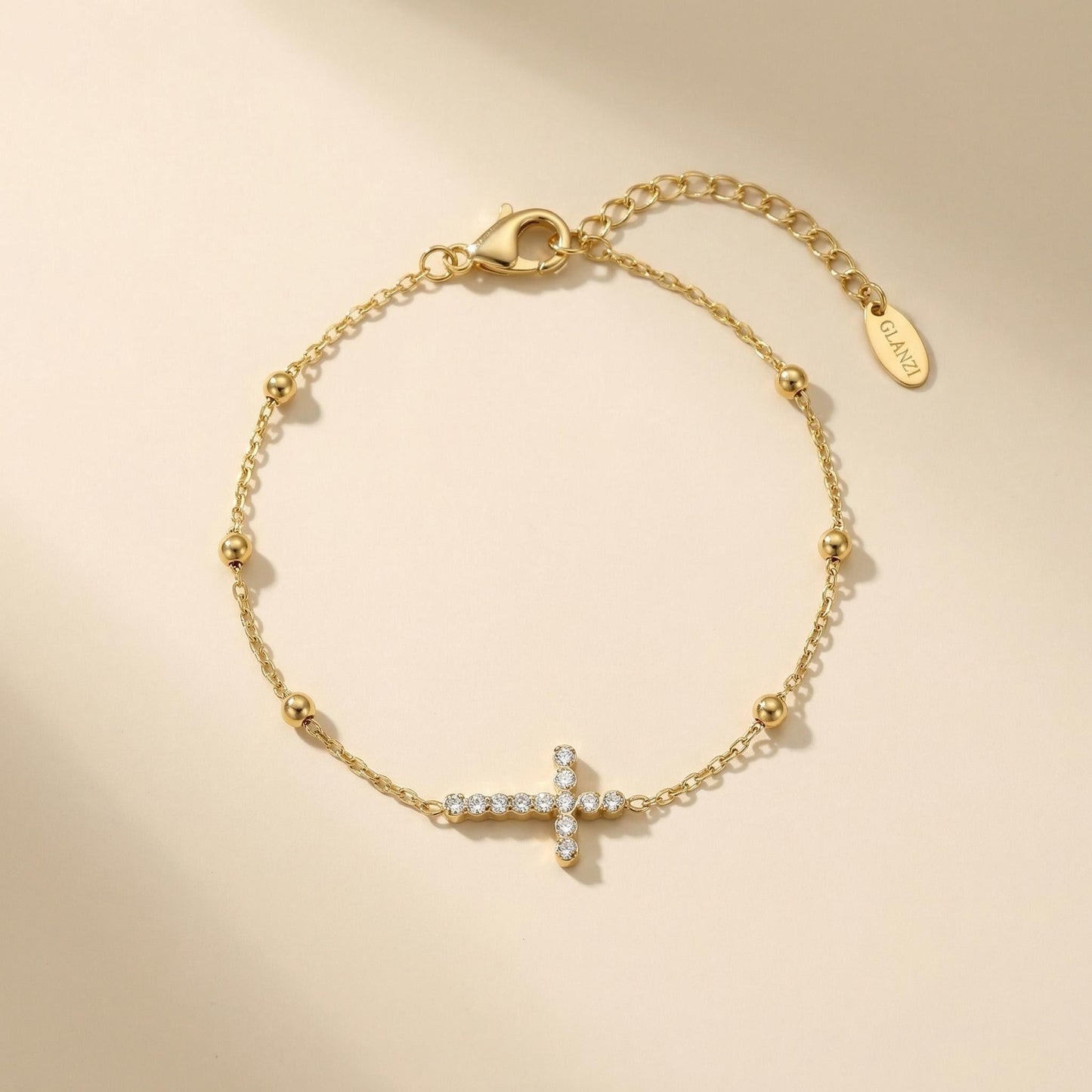 GLANZI Goldene Perlen Armband Kreuz Strass