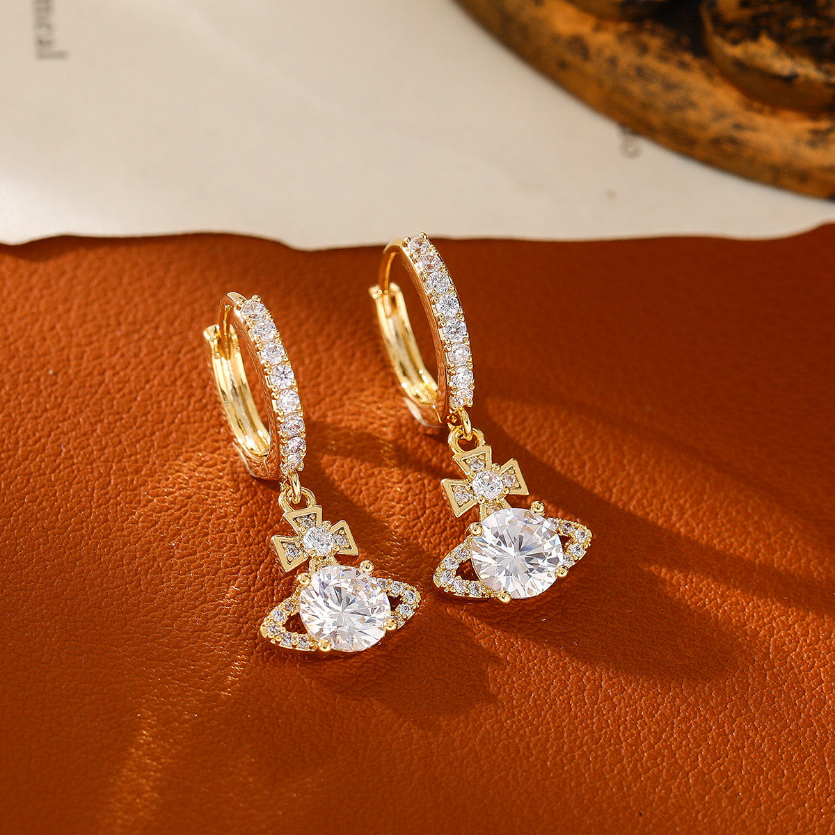 Ohrringe Golden Saturn – Saturn-Design