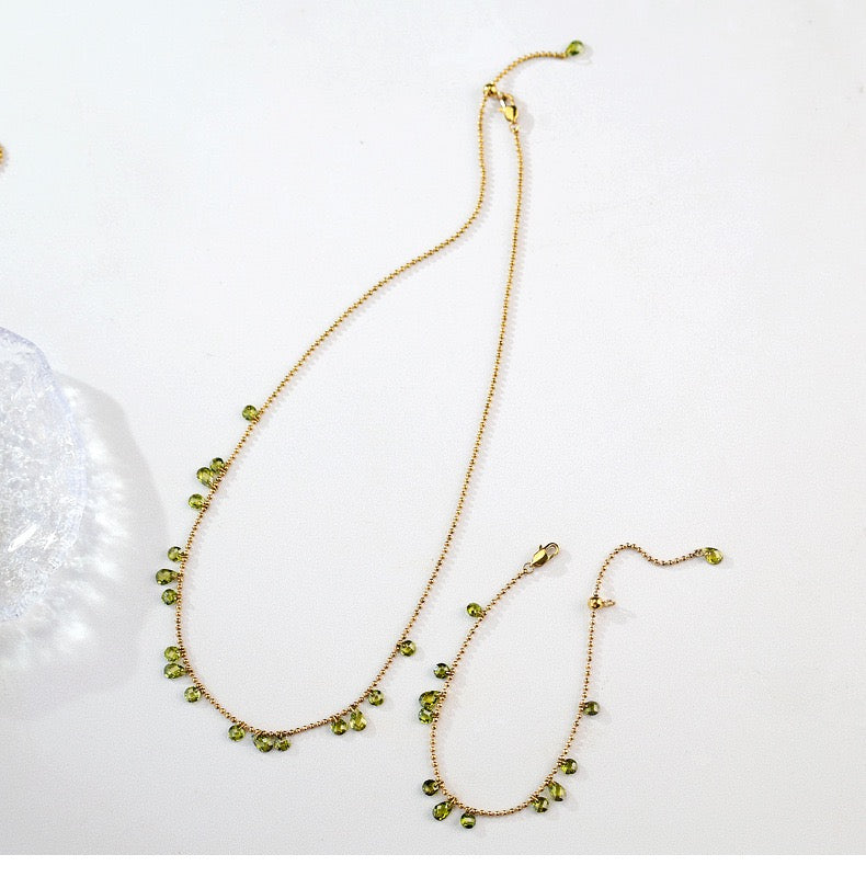 GLANZI Waldlicht Schmuckset - Halskette & Armband mit grünem Zirkonia